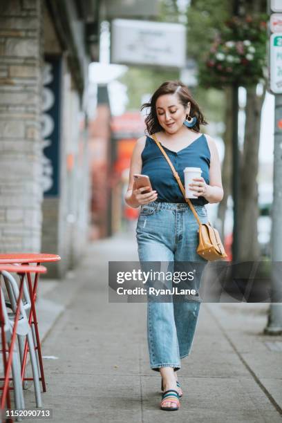 fashionable latina woman in west seattle - seattle coffee stock pictures, royalty-free photos & images