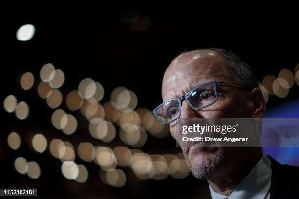 Democratic National Committee chairman Tom Perez speaks to reporters in the spin room ahead of the first Democratic presidential primary debate for...