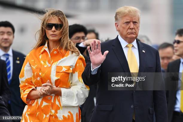 President Donald Trump and his wife Melania Trump , flanked by Shinzo Abe and Akie Abe onboard the Japan's navy ship Kaga on May 28, 2019 in...