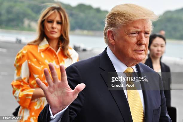 President Donald Trump gestures onboard Japan Maritime Self-Defense Force's helicopter carrier DDH-184 Kaga at JMSDF Yokosuka base on May 28, 2019 in...