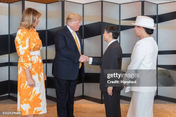 In this handout image provided by Imperial Household Agency, Japanese Emperor Naruhito, U.S. President Donald Trump, Empress Masako and first lady...