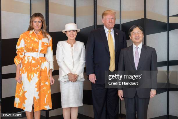 In this handout image provided by Imperial Household Agency, Japanese Emperor Naruhito, U.S. President Donald Trump, Empress Masako and first lady...