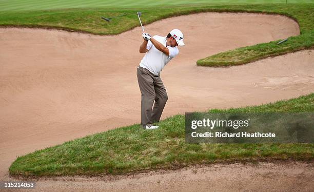 Graeme McDowell of Northern Ireland plays into the 2nd green during the third round of the Saab Wales Open on the Twenty Ten course at The Celtic...