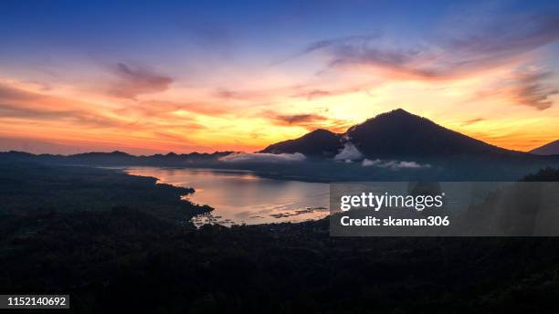 stuning view sunrise of batur lake near kintamani mountain  area bali - kintamani stock pictures, royalty-free photos & images