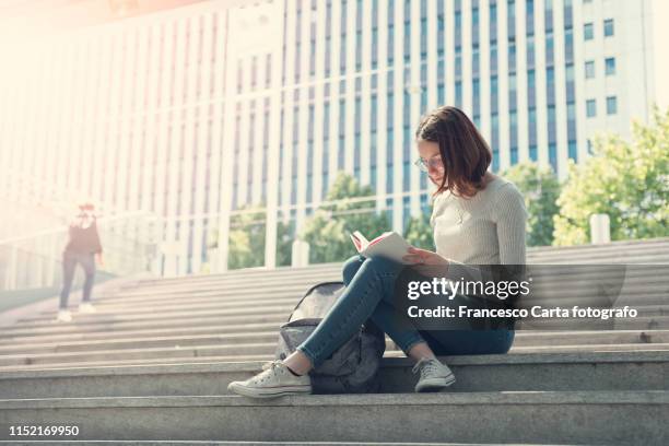 young student - read book outside young woman bildbanksfoton och bilder