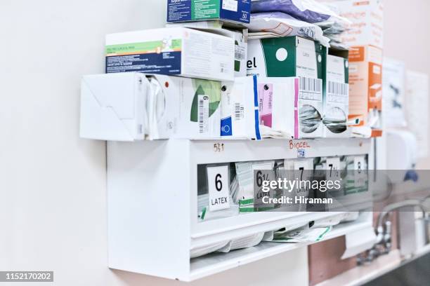 hospital stock piling up - medical glove stock pictures, royalty-free photos & images