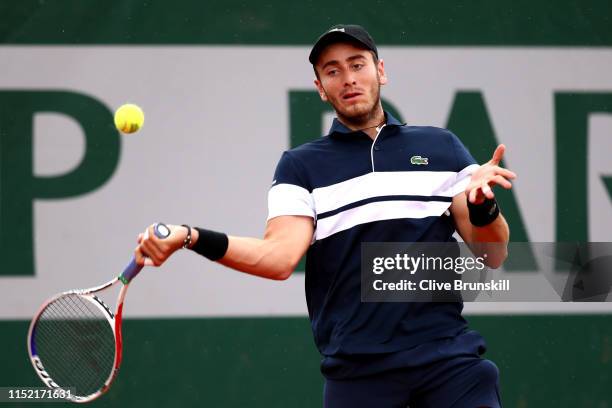 Elliot Benchetrit of France plays a forehand during his mens singles first round match against Cameron Norrie of Great Britain during Day three of...