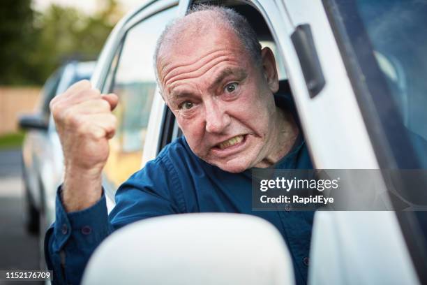 senior man driving suffers attack of road rage - road rage stock pictures, royalty-free photos & images