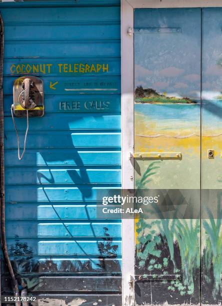 Detail of a painted wall and telephone during the St Barths Bucket Regatta on March 20, 2019 in Gustavia, Saint Barthelemy.