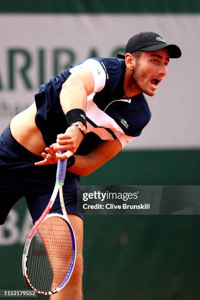 Elliot Benchetrit of France serves during his mens singles first round match against Cameron Norrie of Great Britain during Day three of the 2019...