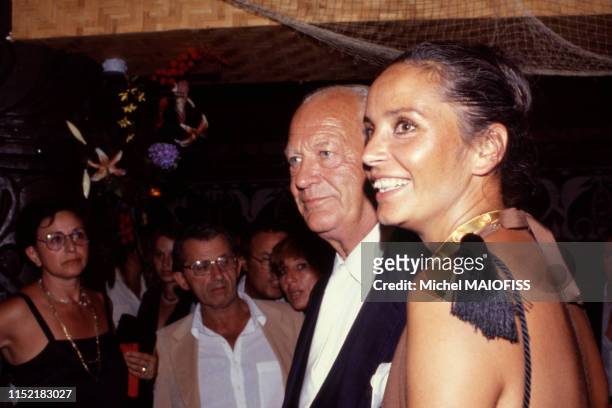 Curd Jürgens et sa femme Margie Schmitz lors d'une soirée à Paris dans les années 80, France. Circa 1980.