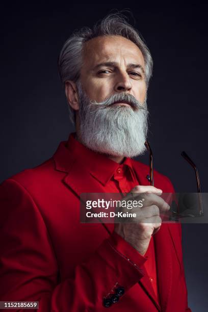 happy well dressed gentleman having photoshooting in studio - beard portrait stock pictures, royalty-free photos & images