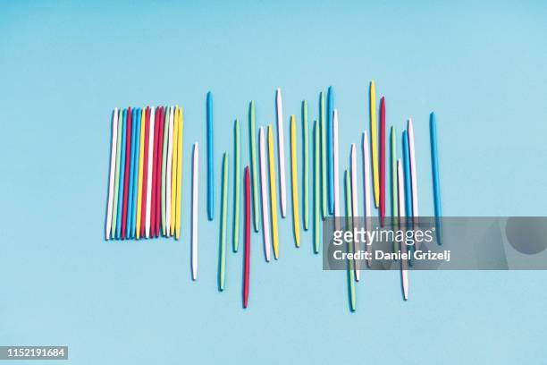 Colored sticks placed in the beginning as a line in order, then turns to chaos