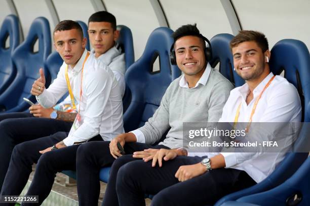 Agustin Urzi of Argentina and his team mates pose for a photo on the bench prior to the 2019 FIFA U-20 World Cup group F match between Portugal and...