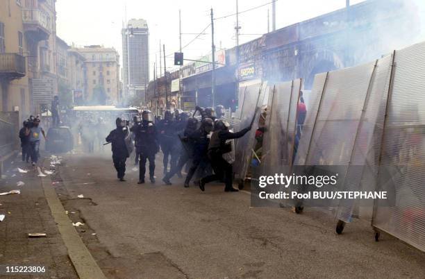 Members of Tutte Bianche clash with police during protests against the 27th Group of Eight Summit in July, 2001 in Genoa, Italy. Hundreds of...