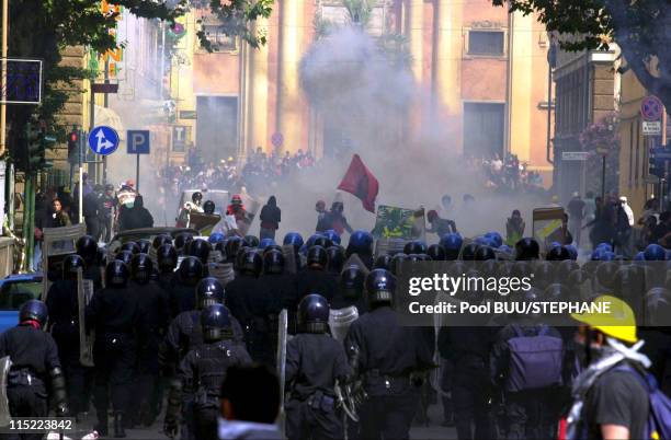 Protesters clash with police during protests against the 27th Group of Eight Summit on July 20, 2001 in Genoa, Italy. Hundreds of thousands of...