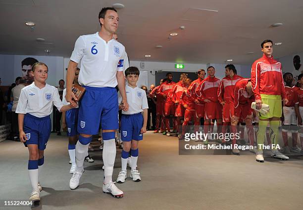 Captain John Terry of England stands in the tunnel ahead of the UEFA EURO 2012 Group G qualifying match between England and Switzerland at Wembley...