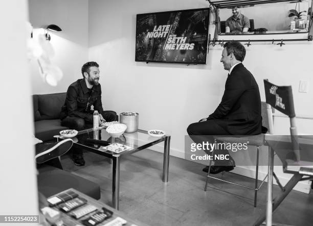 Episode 854 -- Pictured: Comedian Anthony Jeselnik talks with host Seth Meyers backstage on June 26, 2019 --