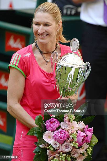 Steffi Graf poses with the cup after the Warsteiner Champions Trophy of the Gerry Weber Open at the Gerry Weber stadium on June 4, 2011 in Halle,...