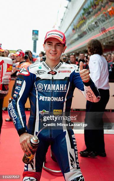 Jorge Lorenzo of Spain and Yamaha Factory Team celebrates the third place at the end of the qualifying practice of MotoGp Of Catalunya at Circuit de...