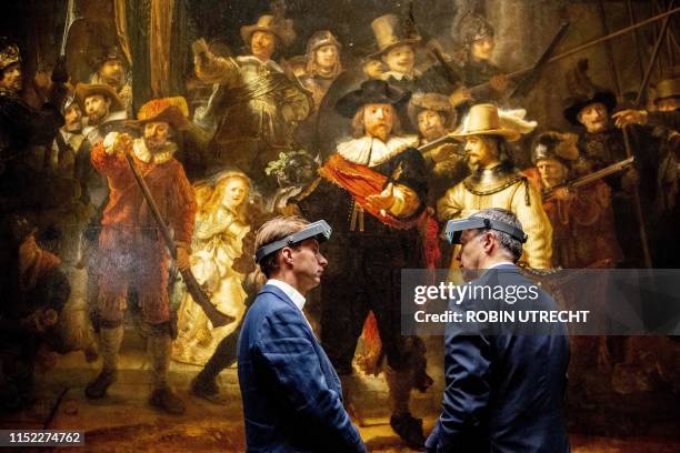 General director of the Rijksmuseum Taco Dibbits and Thierry Vanlancker CEO of Dutch multinational company which creates paints AkzoNobel look at the...