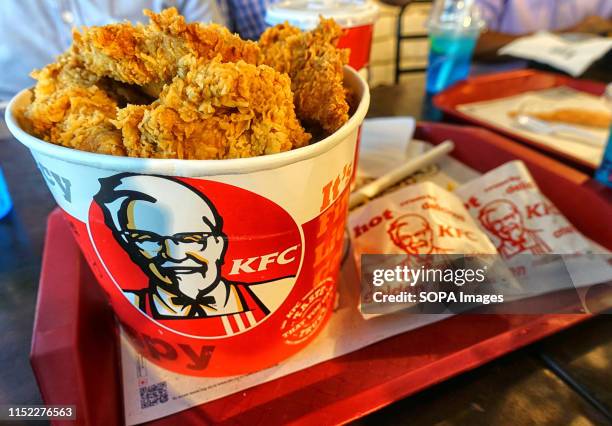 Bucket Chicken at an outlet in City Center shopping mall. KFC, also known as Kentucky Fried Chicken is an American Fast Food Company that provides...