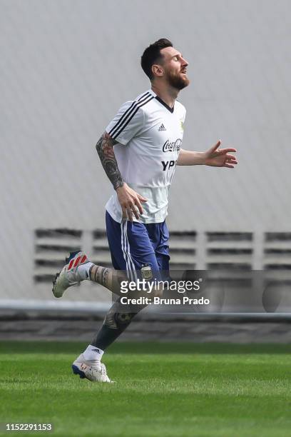 Lionel Messi runs during a training session of the Argentina national football team at Fluminense Training Center on June 27, 2019 in Rio de Janeiro,...