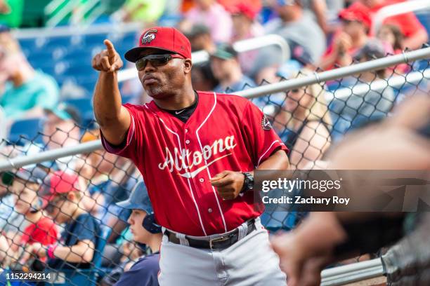 Jon Nunnally of the Altoona Curve signals the bullpen during the ninth inning of the game between the Portland Sea Dogs and the Altoona Curve at...