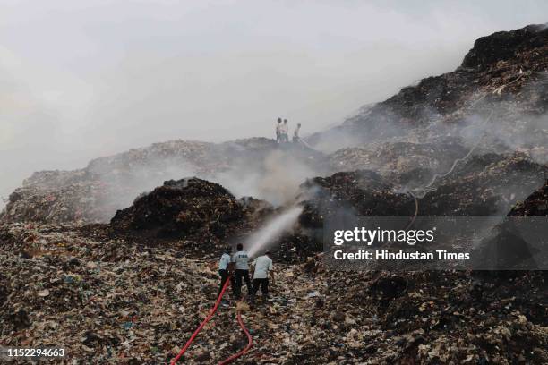 Major fire broke out at Adharwadi dumping ground on Wednesday, enveloping the area with a thick cloud of smoke, on June 26, 2019 in Mumbai, India....