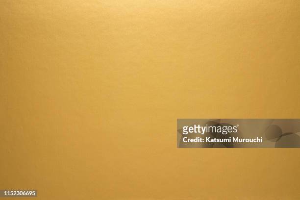 sleek gold paper texture background - metal surface stock-fotos und bilder