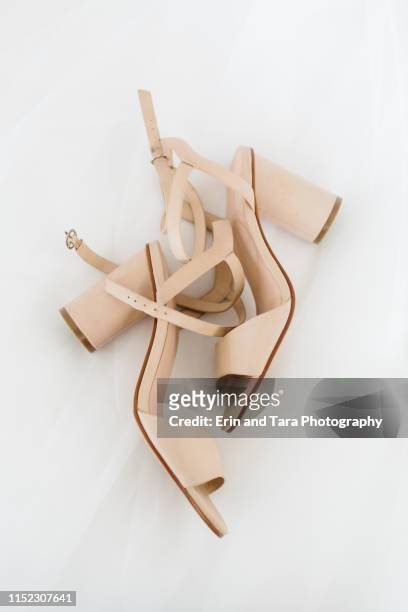 beautiful wedding high heels ready for the big day - beige shoe fotografías e imágenes de stock