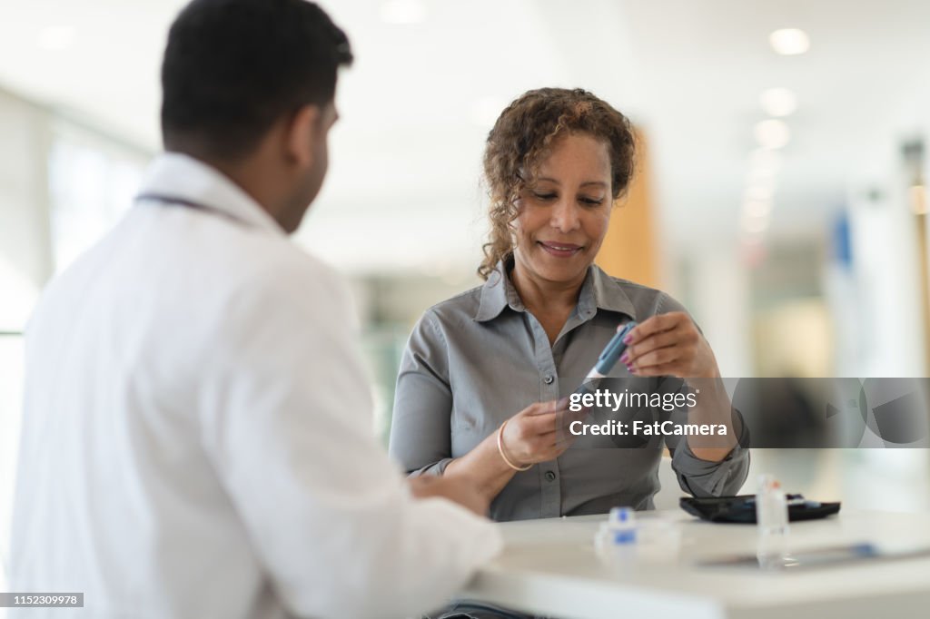 Diabetic patient meets with her doctor