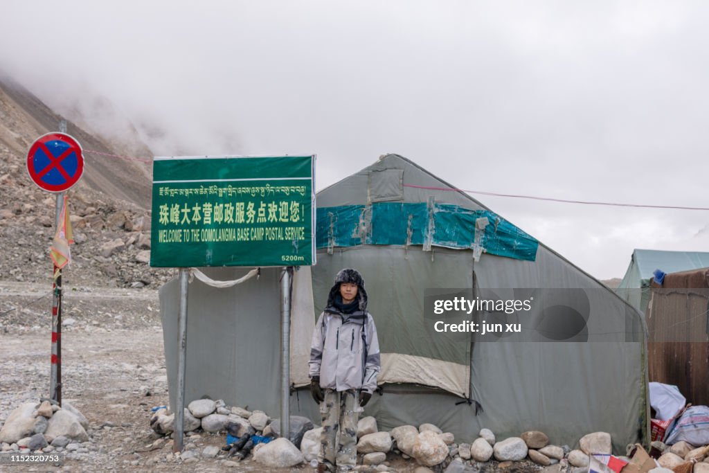 A boy trekking mount Everest in Tibet