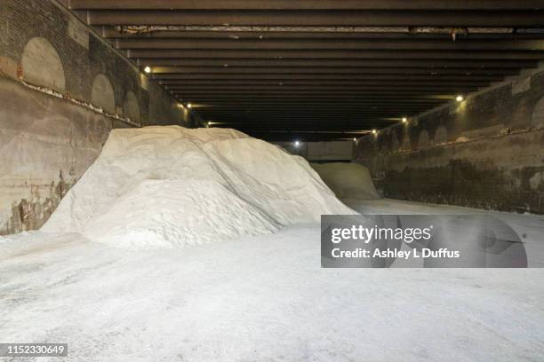 salt pile - schneehaufen stock-fotos und bilder