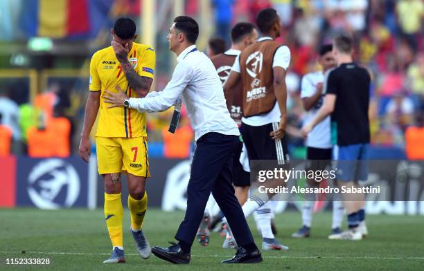 Matei Mirel Radoi head coach of Romania embraces Florinel Coman of Romania at the end the 2019 UEFA U-21 Semi-Final match between Germany and Romania...