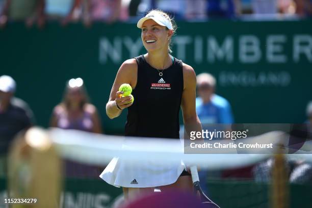 Angelique Kerber of Germany celebrates winning her women's singles quarter-final match against Simona Halep of Romania during day four of the Nature...