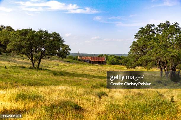 rolling fields of a texas ranch - hill country stock pictures, royalty-free photos & images