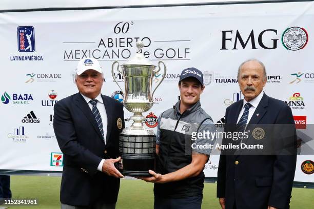 Drew Nesbitt of Canada holds the trophy after the final round of the PGA TOUR Latinoamerica 60º Abierto Mexicano de Golf at Club Campestre Tijuana on...