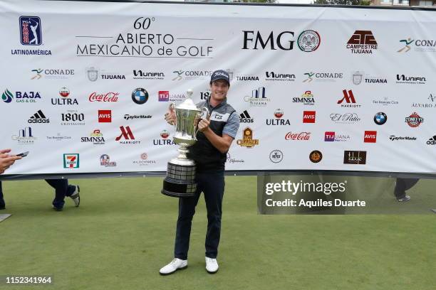 Drew Nesbitt of Canada holds the trophy after the final round of the PGA TOUR Latinoamerica 60º Abierto Mexicano de Golf at Club Campestre Tijuana on...