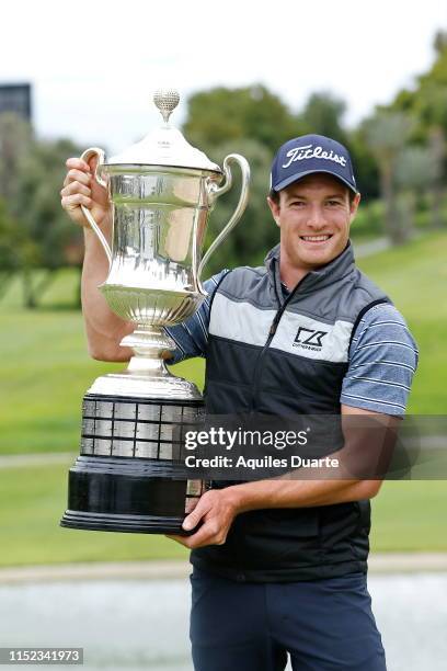 Drew Nesbitt of Canada holds the trophy after the final round of the PGA TOUR Latinoamerica 60º Abierto Mexicano de Golf at Club Campestre Tijuana on...