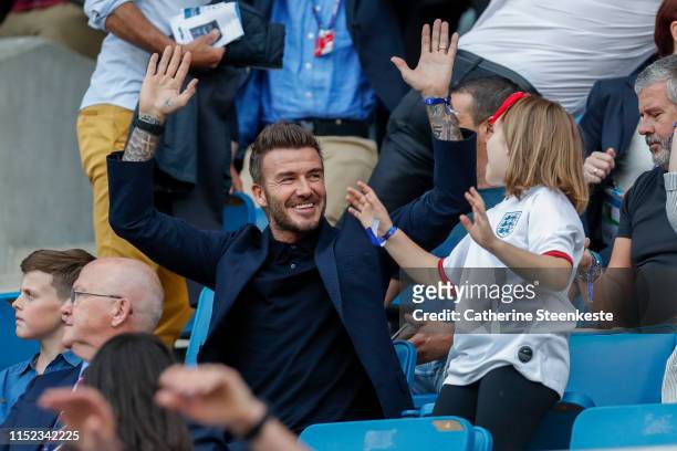 David Beckham and his daughter Harper Beckham enjoy the atmosphere during the 2019 FIFA Women's World Cup France Quarter Final match between Norway...