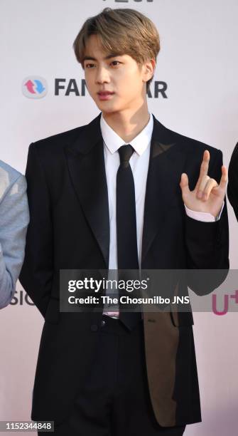 Kim Seok-jin member of BTS attends 'The Fact Music Awards’ held at Namdong Gymnasium in southeastern Incheon on April 24, 2019 in Incheon, South...