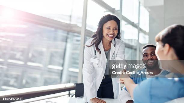 i've been wanting to join your team for ages - doctor talking to patient in hospital stock pictures, royalty-free photos & images