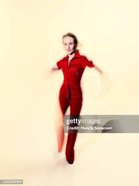 young dancer performing - red jumpsuit stock pictures, royalty-free photos & images