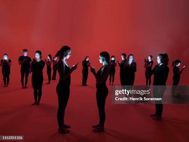 group of people using smartphones - generation z studio stock pictures, royalty-free photos & images