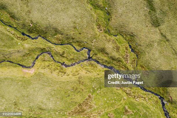 mountain streams joining together - wales countryside stock pictures, royalty-free photos & images