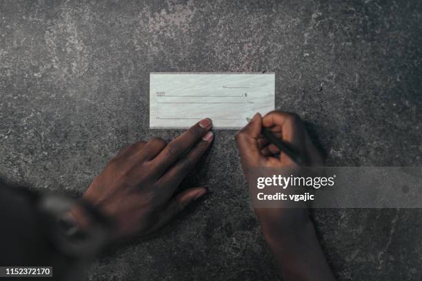Cheque Sing Check Sign Photos and Premium High Res Pictures - Getty Images