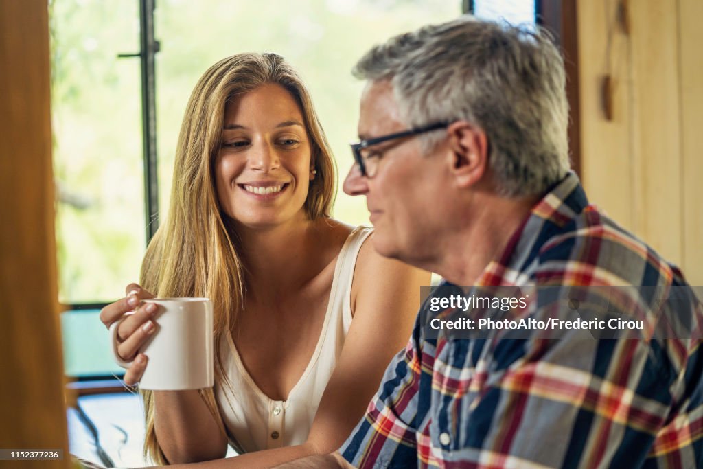 Woman talking with her father