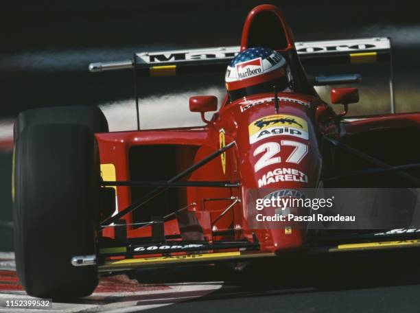 Jean Alesi of France drives the Scuderia Ferrari Ferrari 412T2 Ferrari V12 during the Italian Grand Prix on 10 September 1995 at the Autodromo...