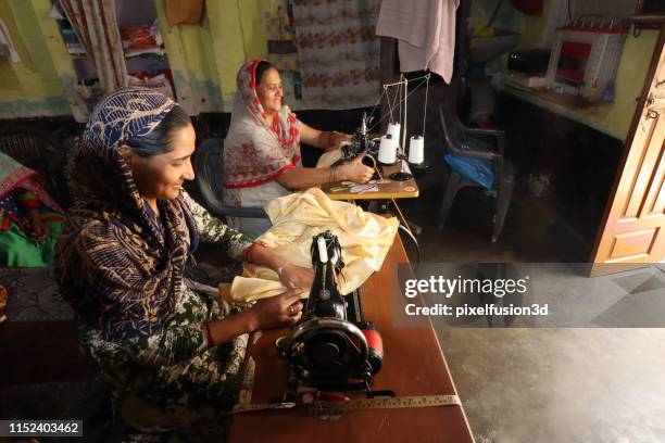 Using Traditional Sewing Machine Old Sewing Machine Table Photos and Premium High Res Pictures - Getty ...